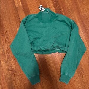 Urban Outfitters “out from under” Cropped Turtleneck Sweatshirt